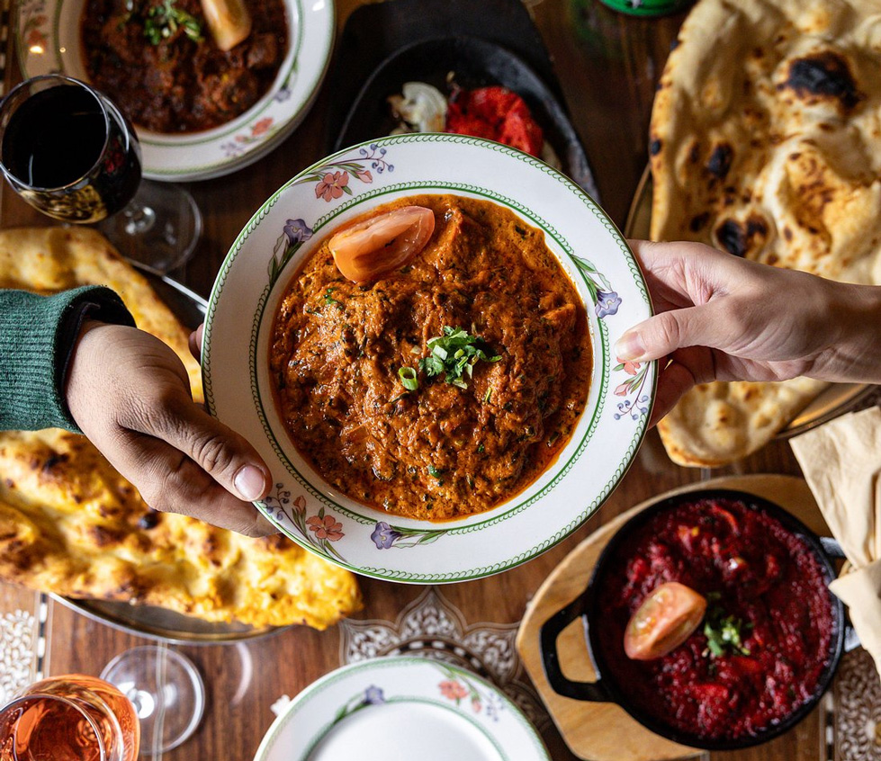 A vibrant overhead view of Indian cuisine with 
Delhi Darbar 'Tea Time Delights'
